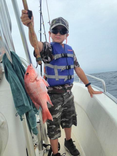 Young angler with a snapper